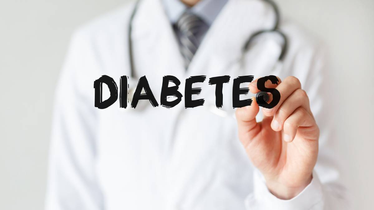 Doctor Writing Word Diabetes With Marker Stock image